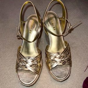 Coach wedges. Gold. Size 9.5. Worn once.